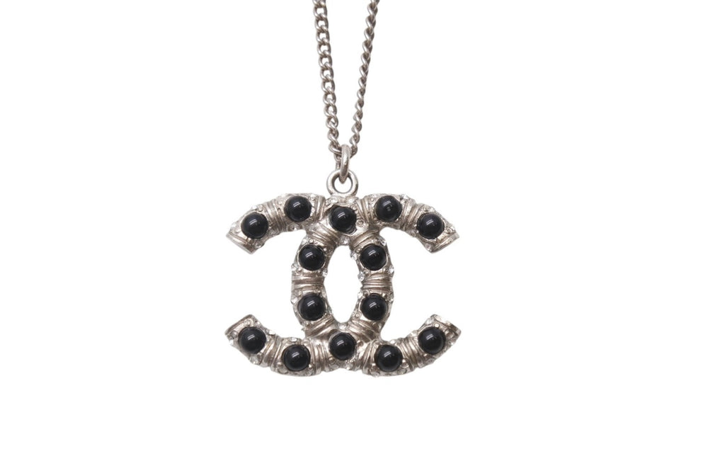 Very good condition CHANEL Coco mark necklace Weight approx. 11.5g 06C stamp Total length approx. 60cm Metal Rhinestone Colored stone Silver Used 4b001048