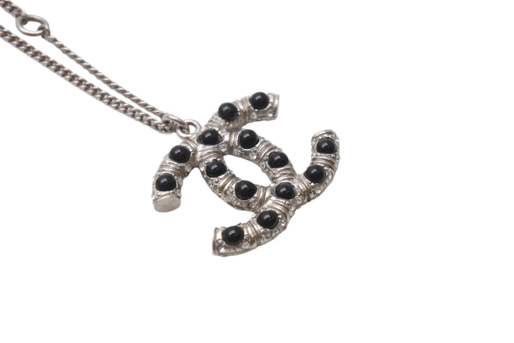 Very good condition CHANEL Coco mark necklace Weight approx. 11.5g 06C stamp Total length approx. 60cm Metal Rhinestone Colored stone Silver Used 4b001048