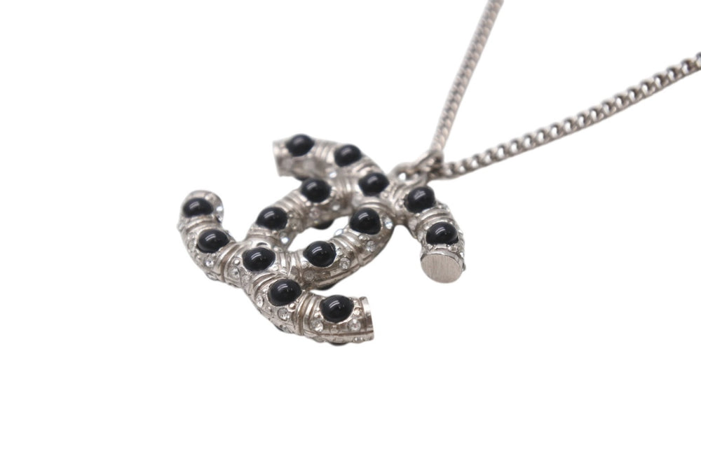 Very good condition CHANEL Coco mark necklace Weight approx. 11.5g 06C stamp Total length approx. 60cm Metal Rhinestone Colored stone Silver Used 4b001048