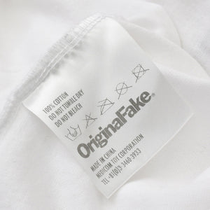 OriginalFake × KAWS オリジナルフェイク × カウズ T-Shirt ホワイト オレンジ コットン100% 美品 中古 4a001299