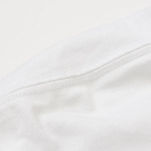 OriginalFake × KAWS オリジナルフェイク × カウズ T-Shirt ホワイト オレンジ コットン100% 美品 中古 4a001299