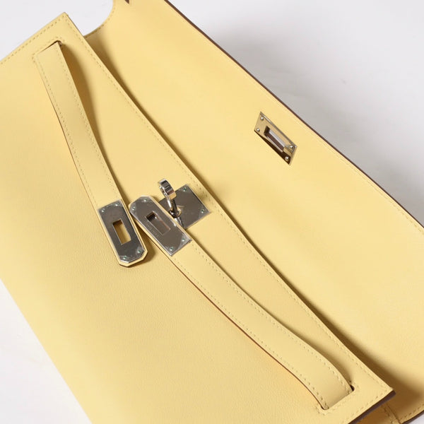 Like new HERMES KELLY CUT Kelly cut handbag Vaux Swift yellow silver hardware T stamp used 4a008756