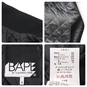 A BATHING APE アベイシングエイプ BAPE ×KAWS カウズ スタジャン 歯型 バーシティジャケット ブラック S メンズ 美品 中古 44707