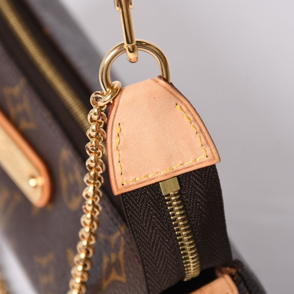 Like new LOUIS VUITTON Pochette Eva Monogram M95567 Brown Gold hardware Used 4a001176