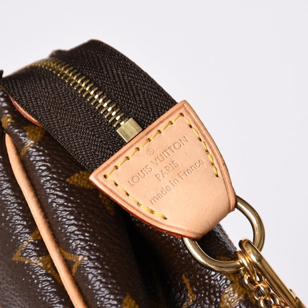 Like new LOUIS VUITTON Pochette Eva Monogram M95567 Brown Gold hardware Used 4a001176
