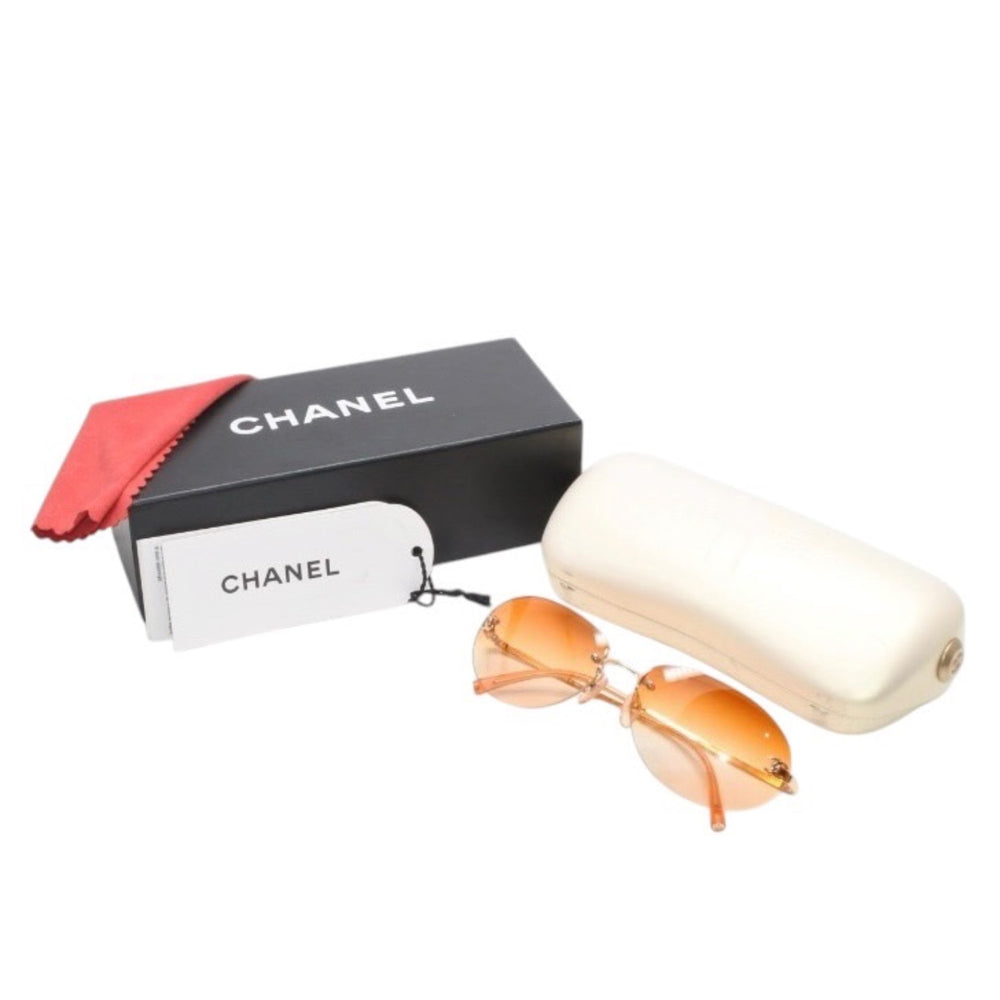 極美品 CHANEL シャネル リムレス サングラス アイウェア 4013 c.125/56 サイズ59□16 130 ココマーク オレンジ グラデーション 中古 4a001354