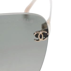 極美品 CHANEL シャネル リムレス サングラス ココマーク グレー チタン製 ケース付き キャッツアイ型レンズ 美品 中古 4a001385