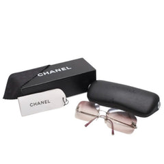 CHANEL rimless sunglasses with Coco Mark rhinestones and pink lenses, model number 4017-D 62◻17 120 Excellent condition Used 4a001384