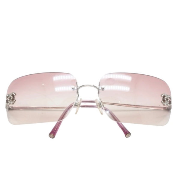 CHANEL rimless sunglasses with Coco Mark rhinestones and pink lenses, model number 4017-D 62◻17 120 Excellent condition Used 4a001384