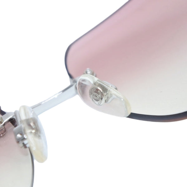 CHANEL rimless sunglasses with Coco Mark rhinestones and pink lenses, model number 4017-D 62◻17 120 Excellent condition Used 4a001384