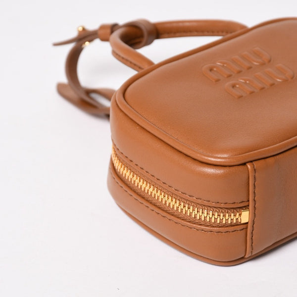 Very good condition Miu Miu Beau Leather Micro Bag Brown Mini Pouch Mini Back Charm Leather 5NR036 Gold Hardware Used 4a003388