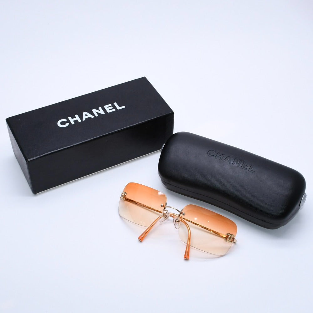 極美品 CHANEL シャネル リムレスサングラス アイウェア メガネ 4017-D c.125/56 ココマーク オレンジ グラデーション 中古 4a003378