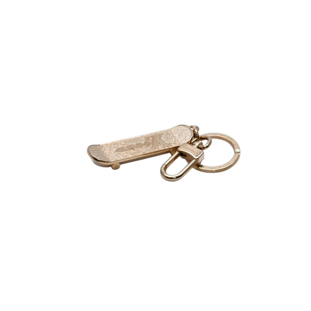 LOUIS VUITTON Keychain LV Skateboard M02187 Pharrell Williams Monogram Gold Good Condition Used 4a002757