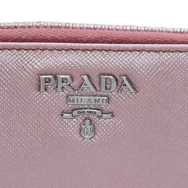 PRADA プラダ 2つ折り財布 コンパクトジップ 財布 ピンク PVC シルバー金具 1M0605R142 美品 中古 4a003019