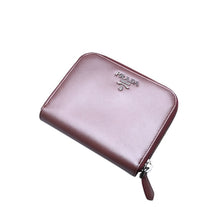 Load image into Gallery viewer, PRADA プラダ 2つ折り財布 コンパクトジップ 財布 ピンク PVC シルバー金具 1M0605R142 美品 中古 4a003019