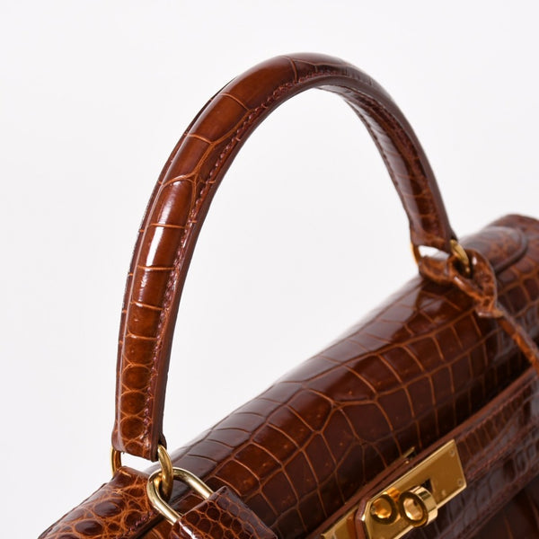 Like new HERMES Kelly 28, external stitching, Miel Porosus leather. ◻B stamp, gold hardware, handbag, pre-owned, item number 4a003498