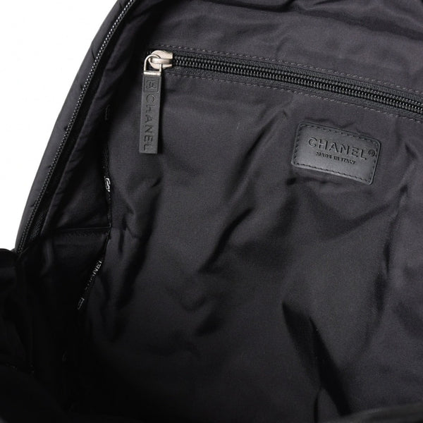 CHANEL CHANEL Sportsline Backpack Rucksack No. 10 Here Mark Nylon Stitch Black White Good Condition Used 4a003832