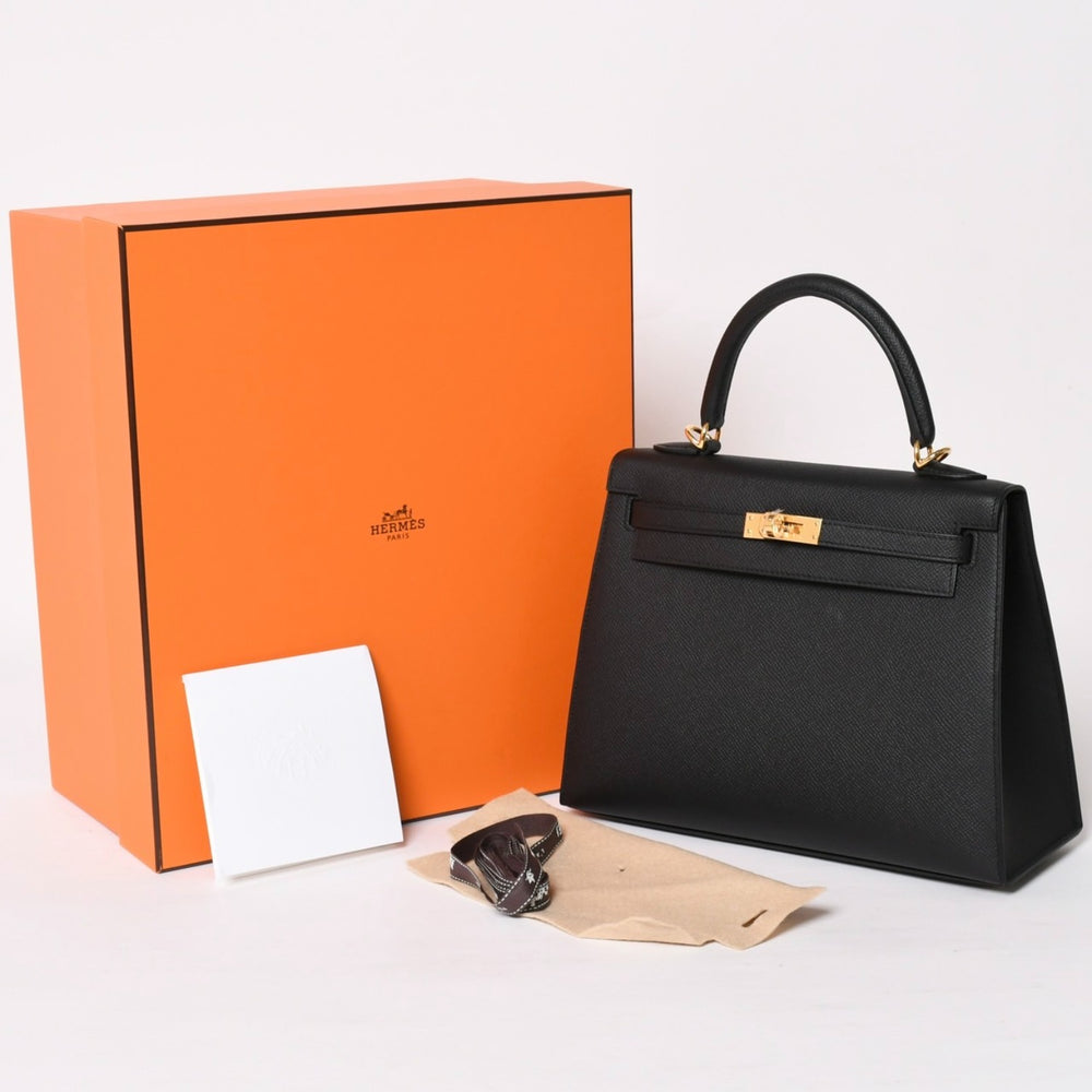 New and unused HERMES Kelly 25 G engraved outside stitching black Vaux Epson gold hardware used 4a003916