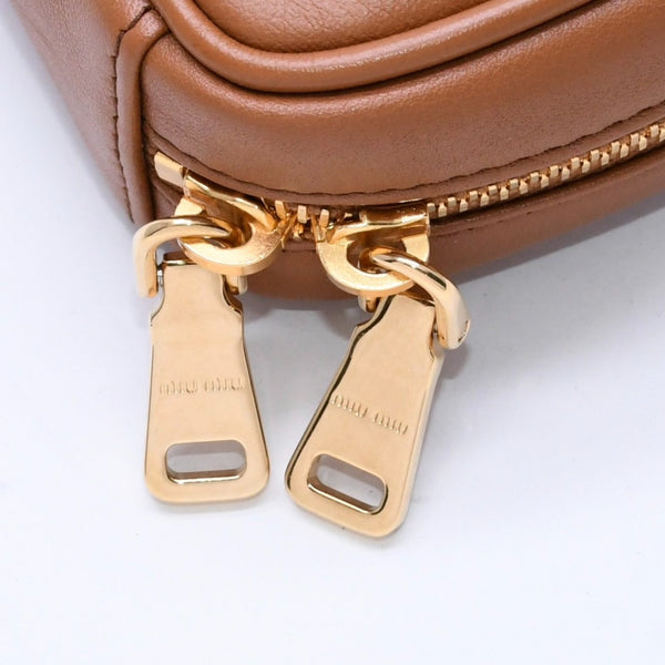 Very good condition MIU MIU Beau Leather Micro Bag Brown Mini Pouch Mini Back Charm Leather 5NR036 Gold Hardware Used 4a003988