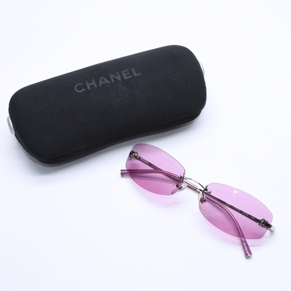 極美品 CHANEL シャネル リムレス サングラス アイウェア 4002 c.124/76 サイズ57□19 130 ココマーク ピンク 中古 4a004491