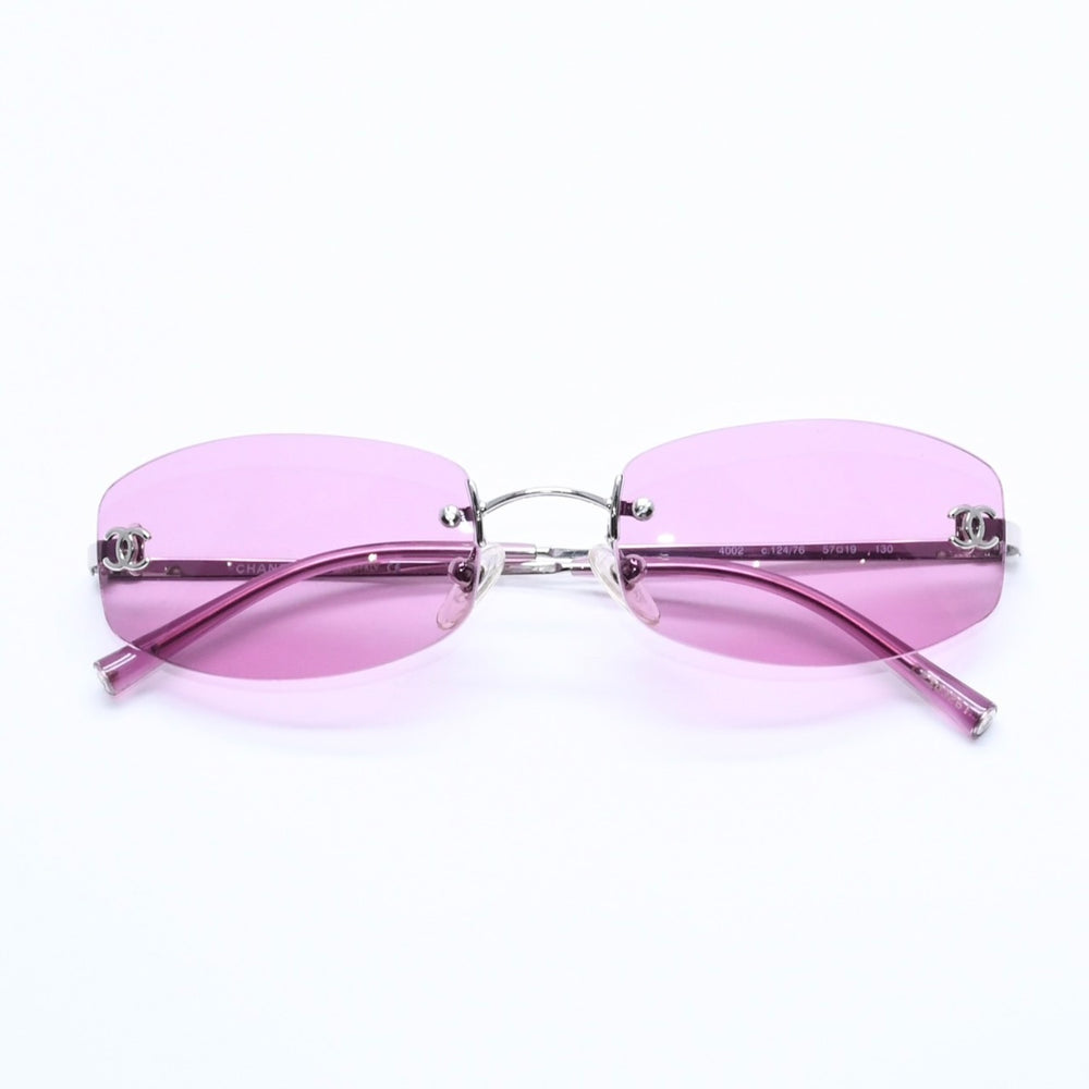 極美品 CHANEL シャネル リムレス サングラス アイウェア 4002 c.124/76 サイズ57□19 130 ココマーク ピンク 中古 4a004491