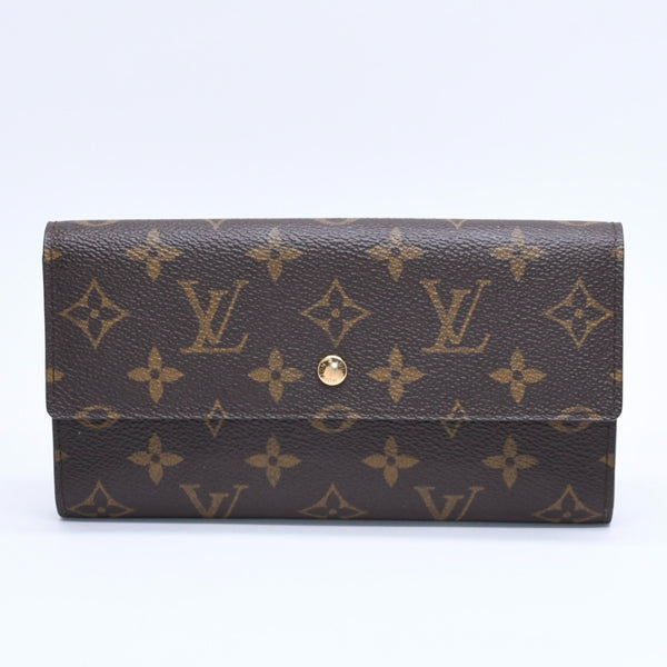 Very good condition LOUIS VUITTON Portefeuil International Trifold Wallet M61217 Monogram Gold Hardware Used 4a004691