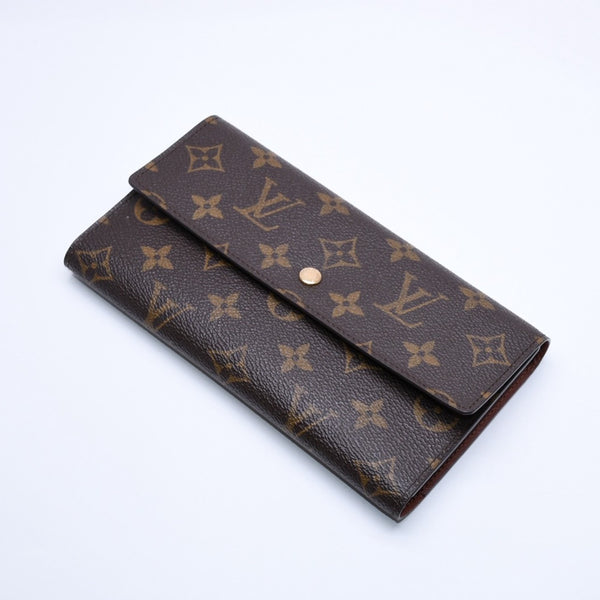 Very good condition LOUIS VUITTON Portefeuil International Trifold Wallet M61217 Monogram Gold Hardware Used 4a004691