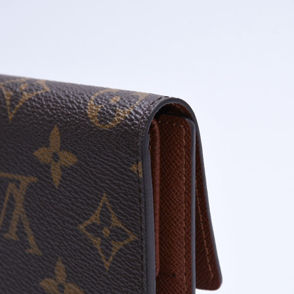 Very good condition LOUIS VUITTON Portefeuil International Trifold Wallet M61217 Monogram Gold Hardware Used 4a004691