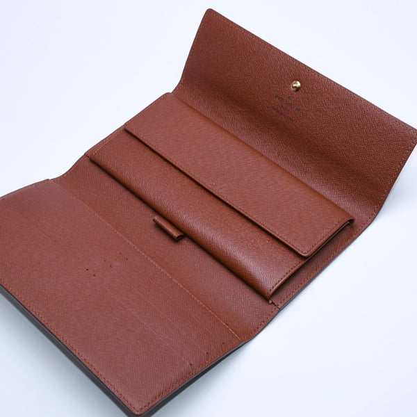 Very good condition LOUIS VUITTON Portefeuil International Trifold Wallet M61217 Monogram Gold Hardware Used 4a004691