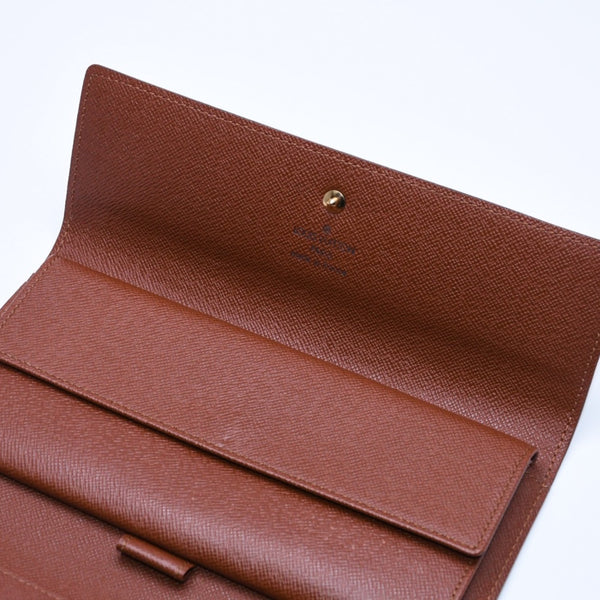 Very good condition LOUIS VUITTON Portefeuil International Trifold Wallet M61217 Monogram Gold Hardware Used 4a004691