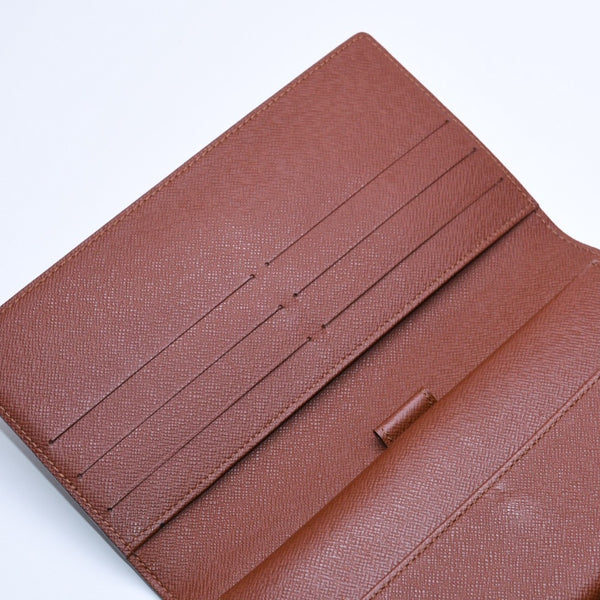 Very good condition LOUIS VUITTON Portefeuil International Trifold Wallet M61217 Monogram Gold Hardware Used 4a004691