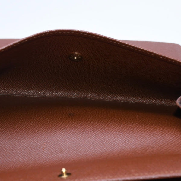 Very good condition LOUIS VUITTON Portefeuil International Trifold Wallet M61217 Monogram Gold Hardware Used 4a004691