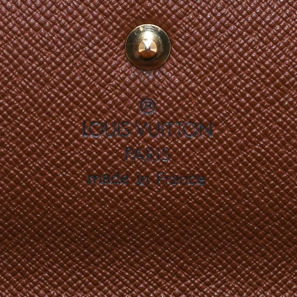 Very good condition LOUIS VUITTON Portefeuil International Trifold Wallet M61217 Monogram Gold Hardware Used 4a004691