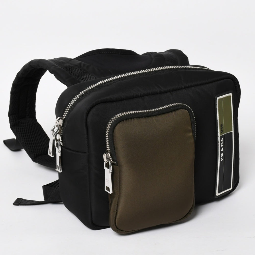 Very Good Condition PRADA TESSUTO POCKET Nylon Backpack Rucksack Body Bag 2VZ044 Black Khaki Rubber Logo Tessuto Nylon Silver Hardware Used 4a004772