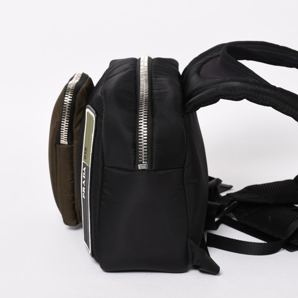 Very Good Condition PRADA TESSUTO POCKET Nylon Backpack Rucksack Body Bag 2VZ044 Black Khaki Rubber Logo Tessuto Nylon Silver Hardware Used 4a004772