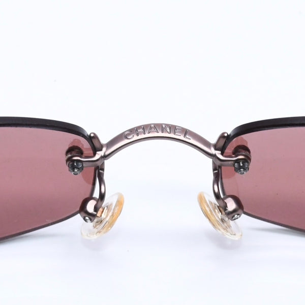 CHANEL シャネル リムレス サングラス サイドココマーク ブロンズ パープル イタリア製 メタル サイズ54◻︎19 美品 中古 4a005423