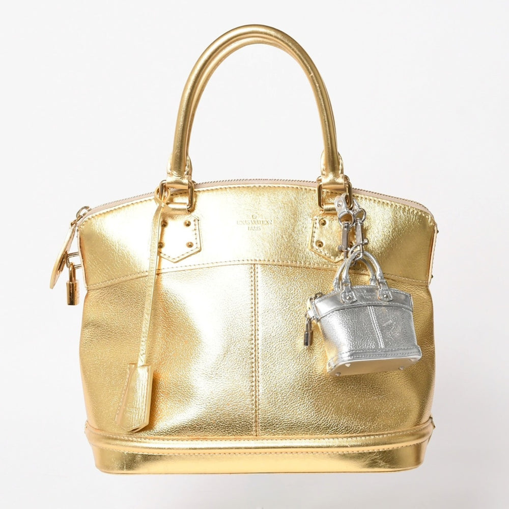 LOUIS VUITTTON ルイヴィトン ロックイット ハンドバッグ スハリ M91874 ゴールド金具 ゴールド シルバー 美品 中古 4a005337