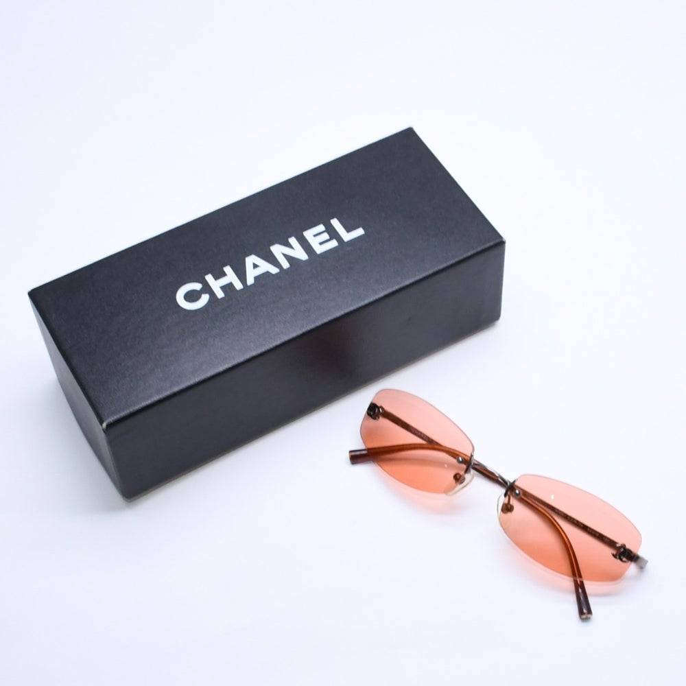 CHANEL シャネル サングラス アイウェア オレンジレンズ ココマーク 4002 サイズ54◻︎19 130 シルバー金具 美品 中古 4a005427