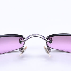 新品未使用 CHANEL シャネル リムレス サングラス アイウェア 4002 c.215/7A サイズ57□19 130 ココマーク パープル 中古 4a005421