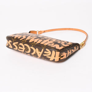 極美品 LOUIS VUITTON ルイヴィトン ポシェットアクセソワ―ル ポーチ M92193 モノグラムグラフィティ ブラウン オレンジ ゴールド金具 中古 4a005835