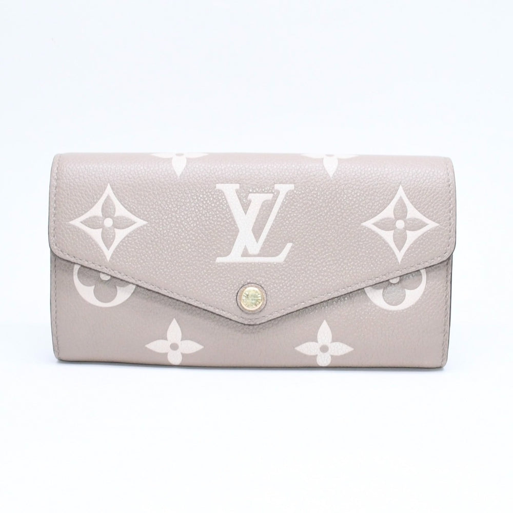 LOUIS VUITTON ルイヴィトン 長財布 財布 ポルトフォイユ・サラ NM ベージュ アイボリー M81049 レザー ゴールド金具 美品 中古 4a006174