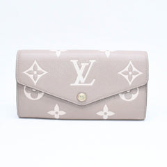 LOUIS VUITTON ルイヴィトン 長財布 財布 ポルトフォイユ・サラ NM ベージュ アイボリー M81049 レザー ゴールド金具 美品 中古 4a006174