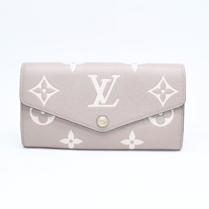 LOUIS VUITTON ルイヴィトン 長財布 財布 ポルトフォイユ・サラ NM ベージュ アイボリー M81049 レザー ゴールド金具 美品 中古 4a006174