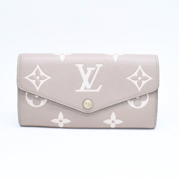 LOUIS VUITTON ルイヴィトン 長財布 財布 ポルトフォイユ・サラ NM ベージュ アイボリー M81049 レザー ゴールド金具 美品 中古 4a006174