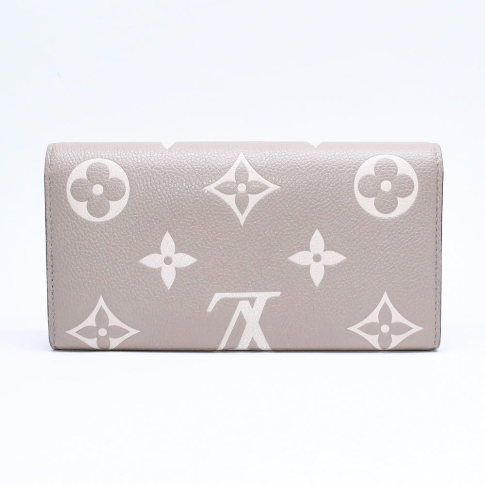 LOUIS VUITTON ルイヴィトン 長財布 財布 ポルトフォイユ・サラ NM ベージュ アイボリー M81049 レザー ゴールド金具 美品 中古 4a006174