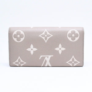 LOUIS VUITTON ルイヴィトン 長財布 財布 ポルトフォイユ・サラ NM ベージュ アイボリー M81049 レザー ゴールド金具 美品 中古 4a006174