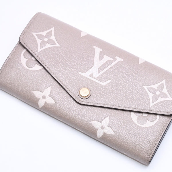 LOUIS VUITTON ルイヴィトン 長財布 財布 ポルトフォイユ・サラ NM ベージュ アイボリー M81049 レザー ゴールド金具 美品 中古 4a006174