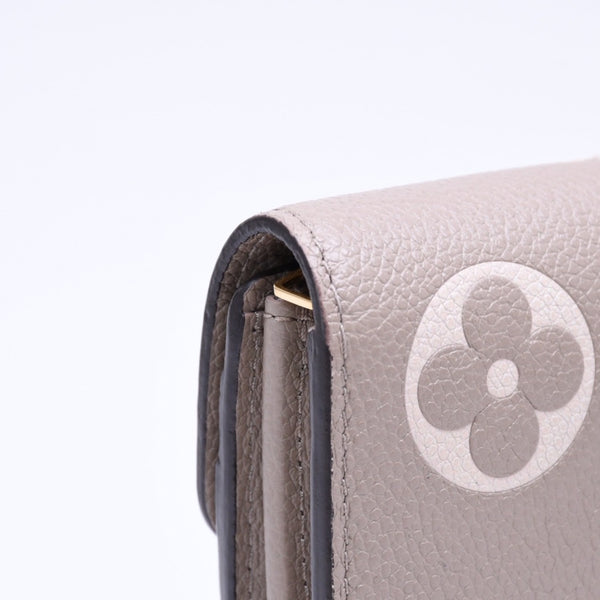 LOUIS VUITTON ルイヴィトン 長財布 財布 ポルトフォイユ・サラ NM ベージュ アイボリー M81049 レザー ゴールド金具 美品 中古 4a006174