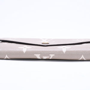 LOUIS VUITTON ルイヴィトン 長財布 財布 ポルトフォイユ・サラ NM ベージュ アイボリー M81049 レザー ゴールド金具 美品 中古 4a006174