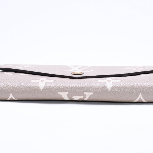 LOUIS VUITTON ルイヴィトン 長財布 財布 ポルトフォイユ・サラ NM ベージュ アイボリー M81049 レザー ゴールド金具 美品 中古 4a006174